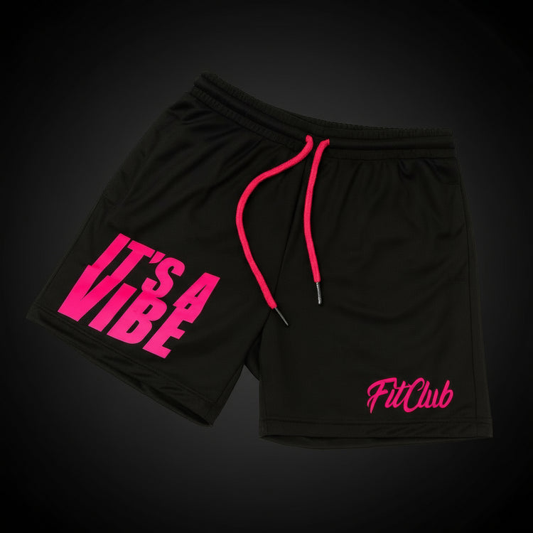 Black shorts with pink text and drawstrings on a white background